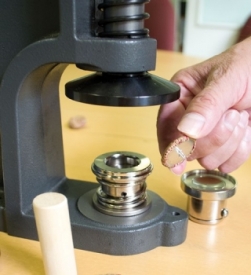 Hand button covering machine